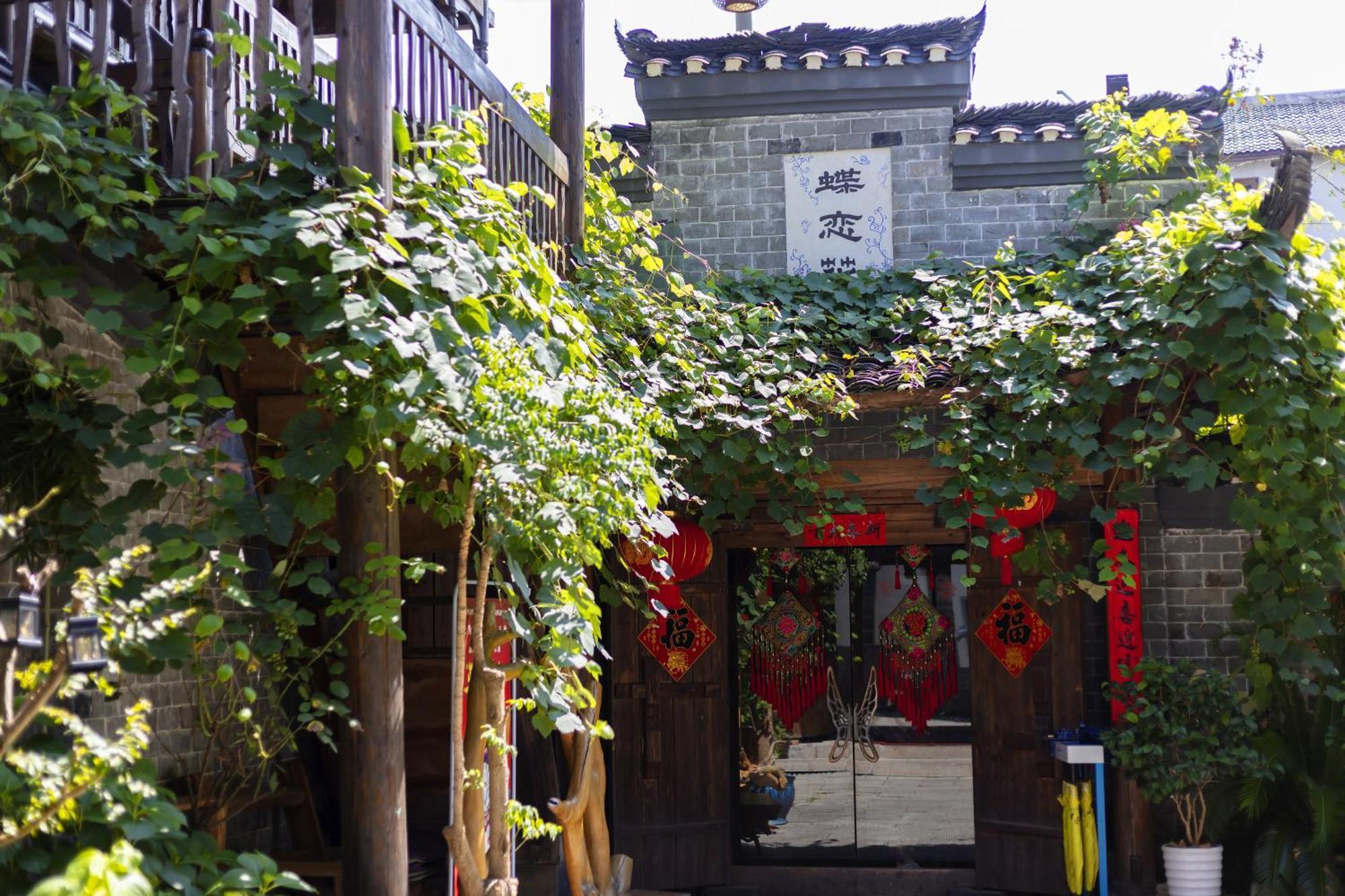 Butterfly Flowers Inn Zhangjiajie Bagian luar foto